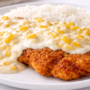 Frango empanado com creme de milho